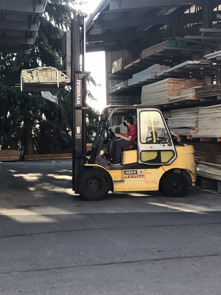 Zach on a forklift-my kid's life path