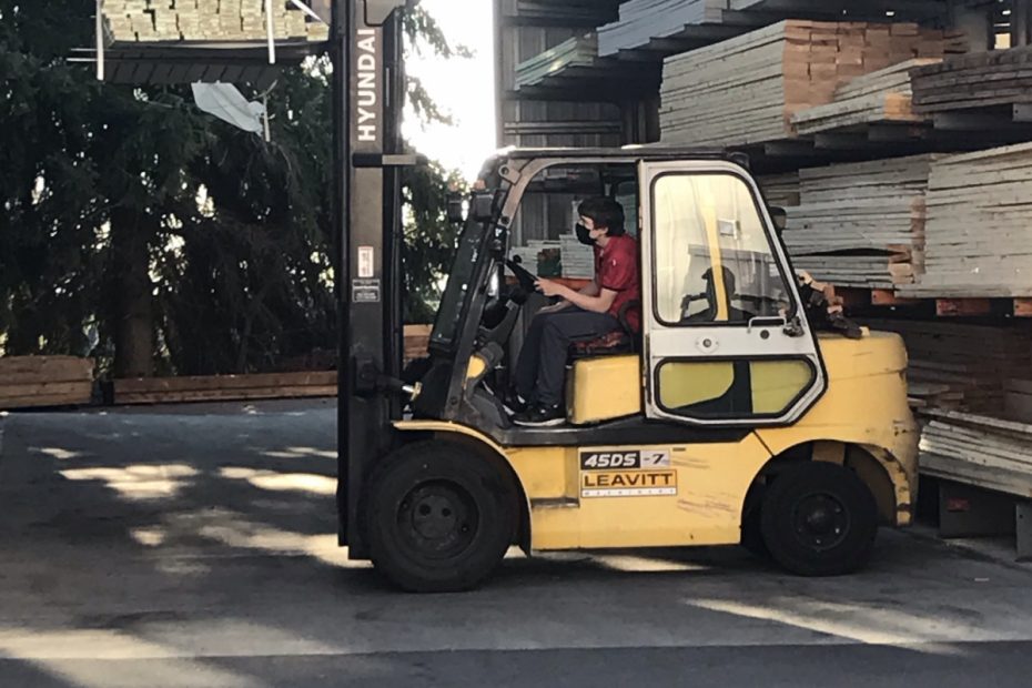 Zach on a forklift-my kid's life path