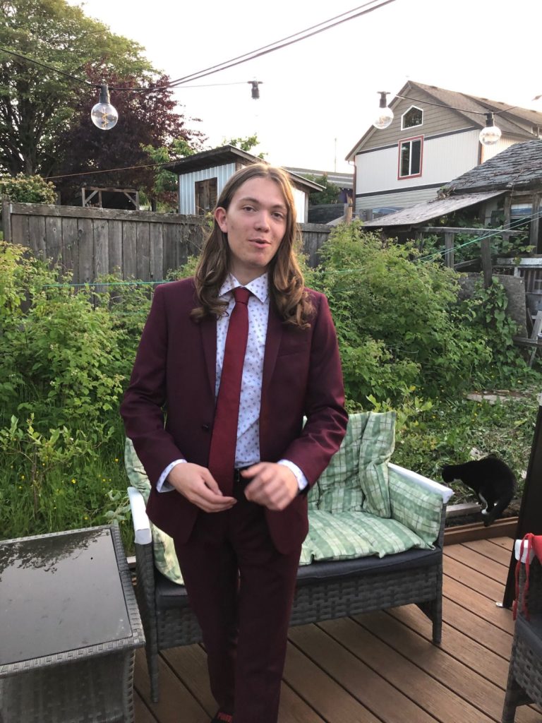 Zachary and his graduation suit