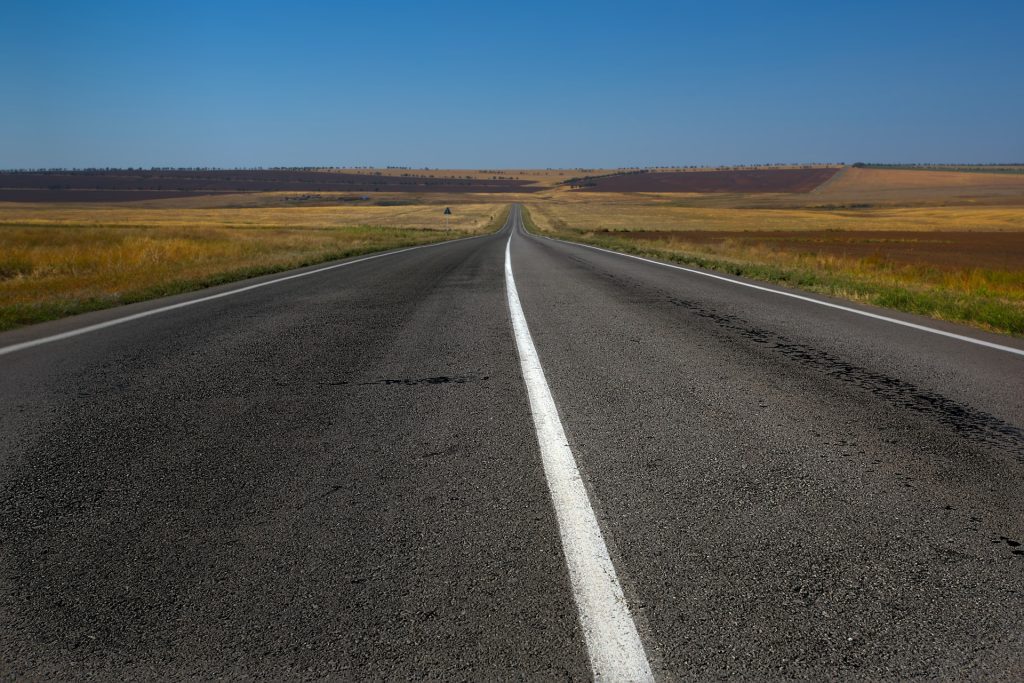 An empty prairie highway