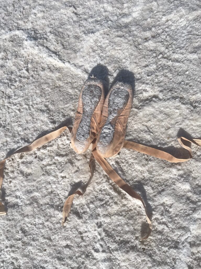Death Valley road trip-point shoes on the Badwater saltflats